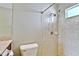 Bright bathroom featuring a tiled shower and granite vanity at 9413 Swift Creek Cir, Dover, FL 33527