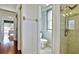 Bright bathroom featuring a glass shower with tile surround and updated fixtures at 9413 Swift Creek Cir, Dover, FL 33527