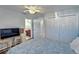 Cozy bedroom with access to the bathroom and a spacious closet at 9413 Swift Creek Cir, Dover, FL 33527