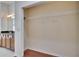 Walk-in closet offering ample storage space and featuring wood floor at 9413 Swift Creek Cir, Dover, FL 33527