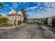 Gated community entrance with a guard house and secure access at 9413 Swift Creek Cir, Dover, FL 33527