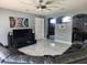Bright living room boasting tile floors, arched doorway, and comfortable sectional sofa at 1919 Blue River Rd, Holiday, FL 34691