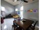 This living room features tall ceilings, lots of light, and an open floor plan at 1919 Blue River Rd, Holiday, FL 34691