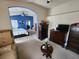 Spacious main bedroom with neutral carpet, blue accent wall, en suite bath, and walk-in closet at 1919 Blue River Rd, Holiday, FL 34691