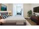 Serene primary bedroom with calming color scheme, comfortable bed, and ample space for relaxation at 32535 Turtle Grace Loop, Wesley Chapel, FL 33545