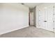 Spacious bedroom featuring double door closet and neutral carpeting at 5283 Everlong Dr, Apollo Beach, FL 33572