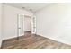 Bedroom with wood-look floors, ample space, and a serene atmosphere at 5283 Everlong Dr, Apollo Beach, FL 33572