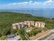 Beautiful aerial view of the entire condo community featuring nearby beaches and ocean views at 12077 Gandy N Blvd # 344, St Petersburg, FL 33702