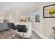 Modern bar with sleek countertops and seating area under a large picture window at 12077 Gandy N Blvd # 344, St Petersburg, FL 33702