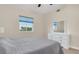 This home's bedroom features a large window and ample storage at 12077 Gandy N Blvd # 344, St Petersburg, FL 33702