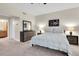 Comfortable bedroom features neutral walls and carpet and ample natural light at 12077 Gandy N Blvd # 344, St Petersburg, FL 33702