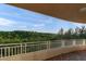 Stunning view of the lush surrounding trees from the balcony at 12077 Gandy N Blvd # 344, St Petersburg, FL 33702