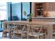 Dining area featuring a wood table with stylish chairs and natural light at 2517 N Riverside Dr, Tampa, FL 33602