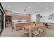 Spacious eat-in kitchen with wood cabinets, stainless steel appliances, and a large island at 2517 N Riverside Dr, Tampa, FL 33602