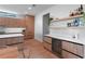 Well-appointed kitchen with light wood cabinets, a center island, and sleek countertops at 2517 N Riverside Dr, Tampa, FL 33602