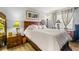 Comfortable main bedroom with a large bed and ample natural light at 3889 Pompano Se Dr # A, St Petersburg, FL 33705