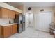 Functional kitchen featuring stainless steel appliances, ample counter space, and neutral-toned cabinetry at 4605 Lisette Cir, Brooksville, FL 34604