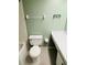 Bathroom featuring a toilet, vanity, and tiled shower/tub combination at 4920 Locust Ne St # 116, St Petersburg, FL 33703