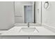 Well-lit bathroom with a single sink vanity and chrome fixtures at 5289 Everlong Dr, Apollo Beach, FL 33572