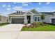 This beautifully landscaped single-Gathering home has a convenient two-car garage at 5289 Everlong Dr, Apollo Beach, FL 33572