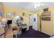 Comfortable bedroom with a writing desk, natural light, and light yellow walls providing a nice setting at 5309 21St S Ave, Gulfport, FL 33707
