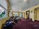 Spacious living room with large windows, seamlessly connecting to other parts of the house at 5309 21St S Ave, Gulfport, FL 33707