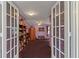 Open entryway showcases the living room with french doors, with ample space for furniture at 5309 21St S Ave, Gulfport, FL 33707