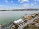 Waterfront property showcasing beautiful landscaping, private docks, and convenient street parking for residents at 800 Madonna Blvd # 2, Tierra Verde, FL 33715
