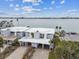 Aerial shot of stunning waterfront properties offers a glimpse of the luxurious coastal lifestyle at 800 Madonna Blvd # 2, Tierra Verde, FL 33715