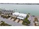 Aerial view of a waterfront community with ample parking and stunning views, perfect for enjoying a coastal lifestyle at 800 Madonna Blvd # 2, Tierra Verde, FL 33715