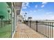 Paved patio with pool access and tranquil waterfront views offers outdoor enjoyment at 800 Madonna Blvd # 2, Tierra Verde, FL 33715