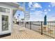 Outdoor spiral staircase leads to a waterfront pool area for relaxation at 800 Madonna Blvd # 2, Tierra Verde, FL 33715