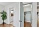 Hallway featuring a closet and access to the kitchen, blending functionality with modern living at 800 Madonna Blvd # 2, Tierra Verde, FL 33715