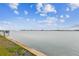 Stunning waterfront view, ideal for boating, fishing, or simply enjoying the beauty of nature from your backyard at 800 Madonna Blvd # 2, Tierra Verde, FL 33715
