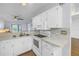 Well-lit kitchen featuring modern appliances and stylish countertops at 11201 122Nd Ave # 204, Largo, FL 33778