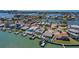 Beautiful aerial view of waterfront homes with boat docks and stunning canal views, perfect for boaters at 16108 5Th E St, Redington Beach, FL 33708