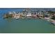 The aerial view shows the expansive waterfront footage and the property's easy access to waterways at 16108 5Th E St, Redington Beach, FL 33708