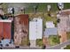 Aerial view of waterfront home featuring spacious lot, private dock, and verdant surroundings at 16108 5Th E St, Redington Beach, FL 33708