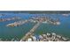 Stunning aerial view of waterfront community with houses nestled among canals and waterways at 16108 5Th E St, Redington Beach, FL 33708