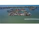 Picturesque aerial view of a residential island community with waterfront homes and scenic waterways at 16108 5Th E St, Redington Beach, FL 33708