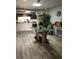 Inviting dining space with updated flooring, contemporary decor, and plenty of sunlight at 16108 5Th E St, Redington Beach, FL 33708