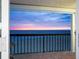 Open balcony provides a relaxing view of the ocean and the sunset at 19450 Gulf Blvd # 401, Indian Shores, FL 33785