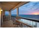 Enjoy breathtaking ocean views from the spacious balcony, perfect for relaxing and entertaining at 19450 Gulf Blvd # 401, Indian Shores, FL 33785
