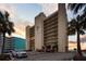 Luxury condominium building featuring a beachfront location, convenient parking, and stunning coastal vistas at 19450 Gulf Blvd # 401, Indian Shores, FL 33785