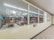 Cozy library with a wide selection of books and comfortable seating areas for reading at 2258 World Parkway W Blvd # 8, Clearwater, FL 33763
