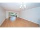Bright and airy living room showcasing hardwood floors and ample natural light at 2258 World Parkway W Blvd # 8, Clearwater, FL 33763
