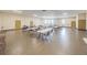 Meeting room with tables, chairs, and natural light, ideal for collaborative discussions at 2258 World Parkway W Blvd # 8, Clearwater, FL 33763