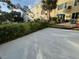 Condo patio overlooking the landscaped lawn, ideal for outdoor lounging at 2258 World Parkway W Blvd # 8, Clearwater, FL 33763