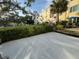 Condo patio overlooking the landscaped lawn, perfect for outdoor relaxing at 2258 World Parkway W Blvd # 8, Clearwater, FL 33763