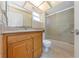 Bathroom featuring a vanity, toilet, and shower at 435 Meadowlark Ln, Palm Harbor, FL 34683